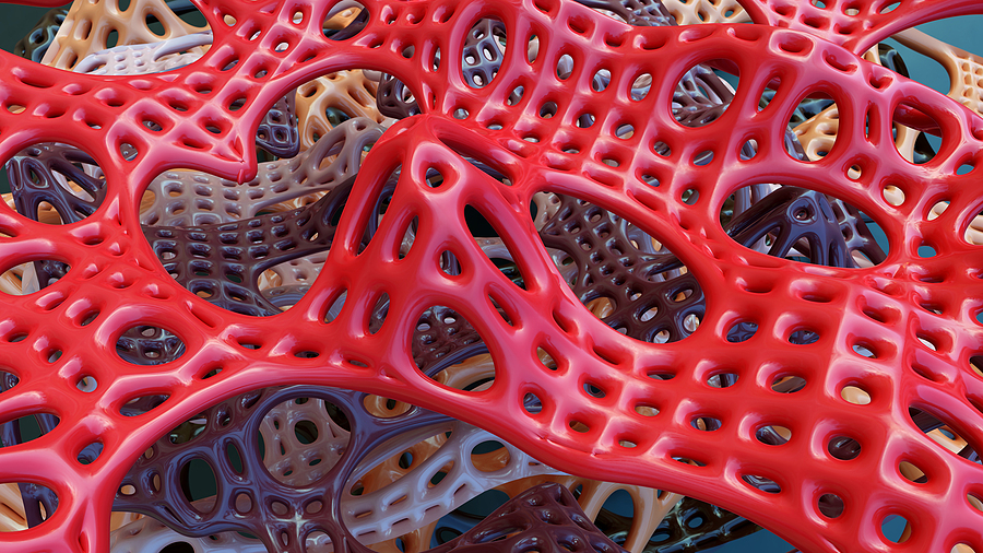 A close-up of red, warped plastic meshed atop similarly warped mesh of varying colors.
