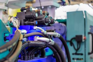 Close-up of an plastic injection molding machine.