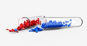 Red and blue polymer resin in sample test tubes.